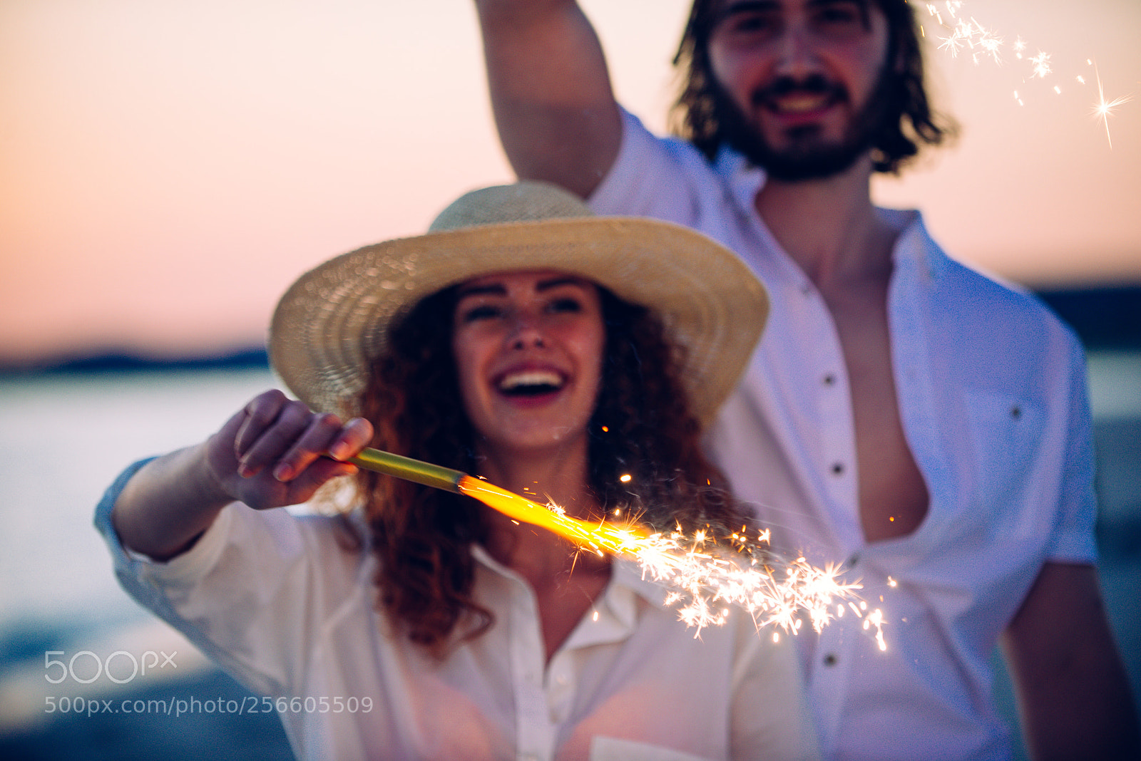 Nikon D610 sample photo. Young couple sharing happy photography