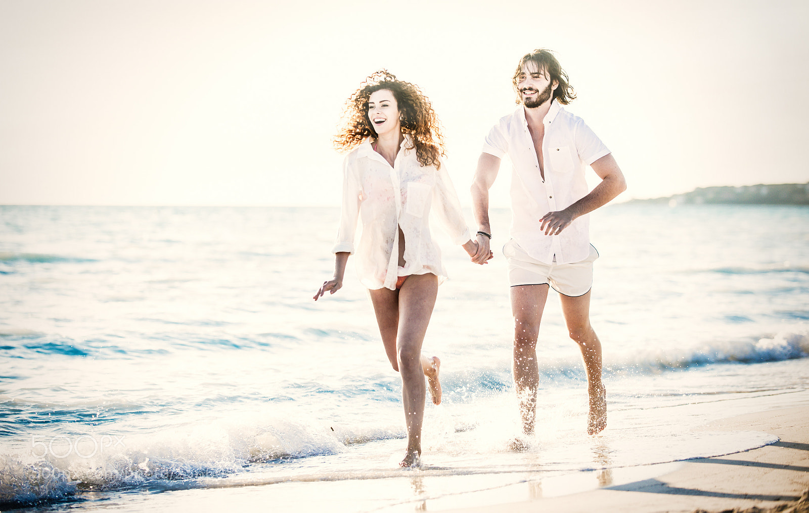 Nikon D610 sample photo. Young couple sharing happy photography