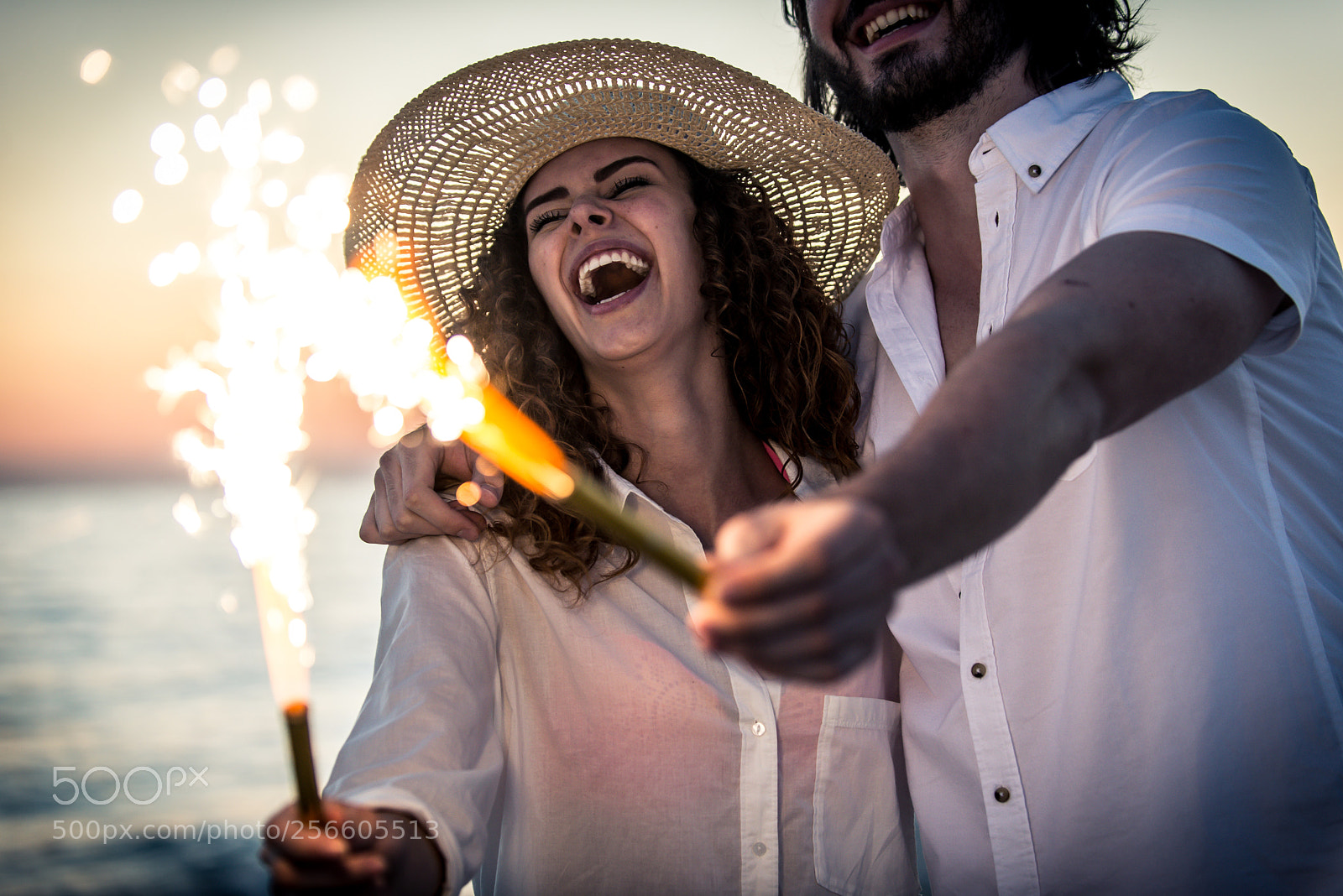 Nikon D610 sample photo. Young couple sharing happy photography
