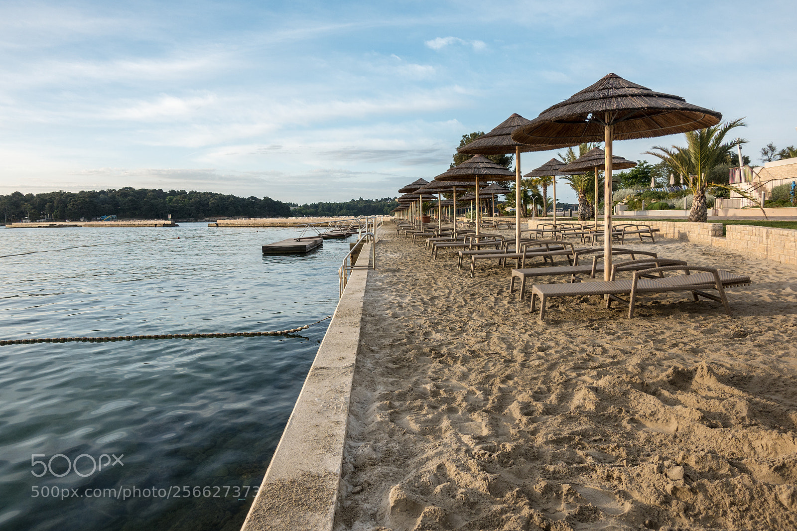 Sony DSC-RX100M5 sample photo. Beach with beach chairs photography