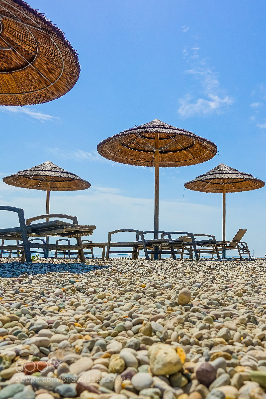 Sony DSC-RX100M5 sample photo. Beach with beach chairs photography