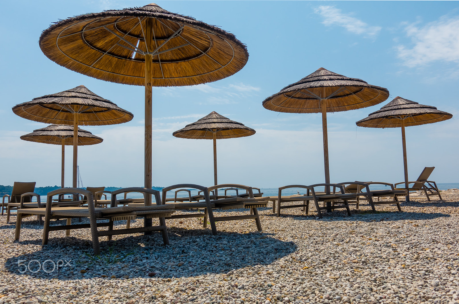 Sony DSC-RX100M5 sample photo. Beach with beach chairs photography
