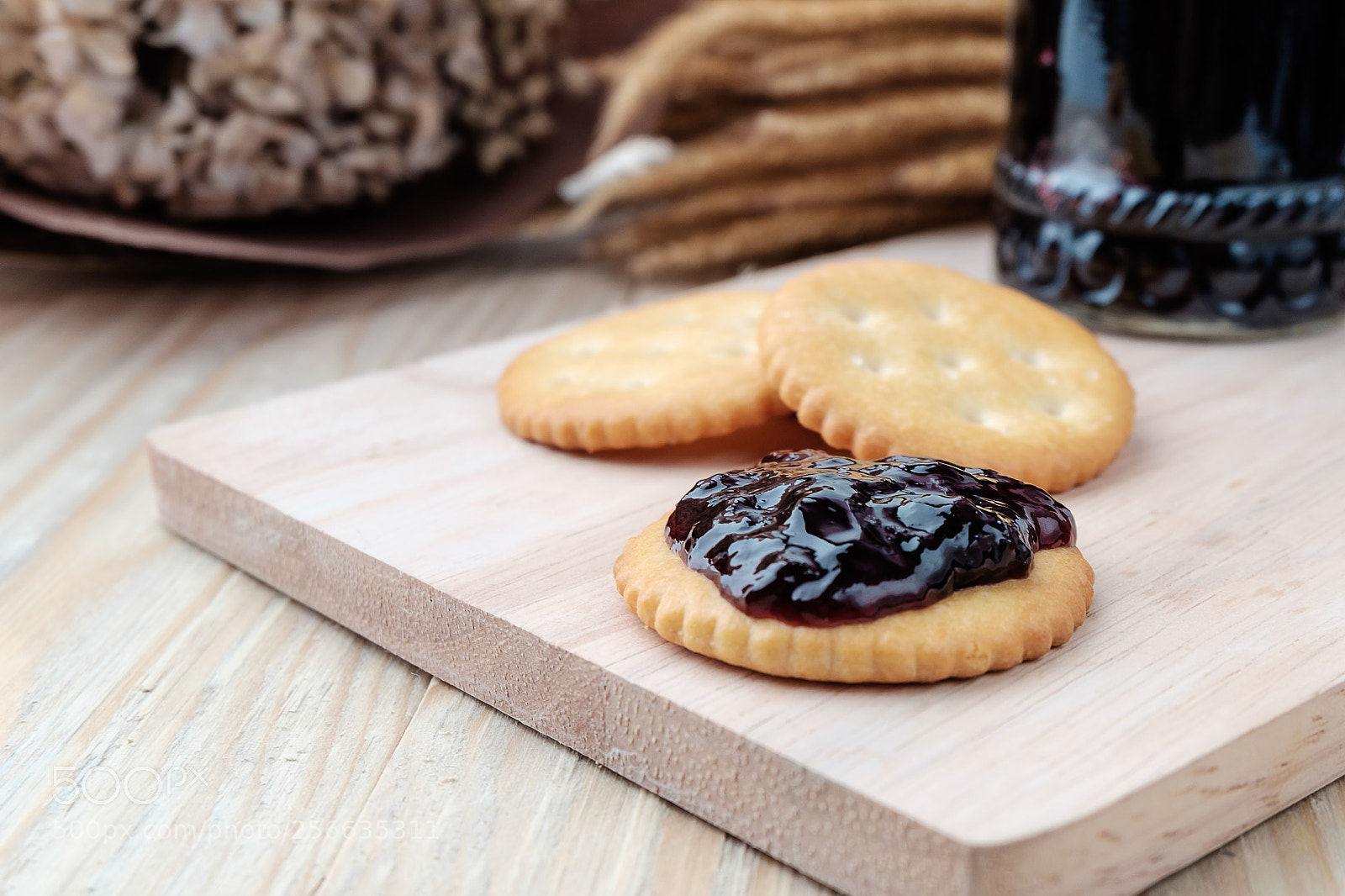 Fujifilm X-T10 sample photo. Cracker with jam on photography