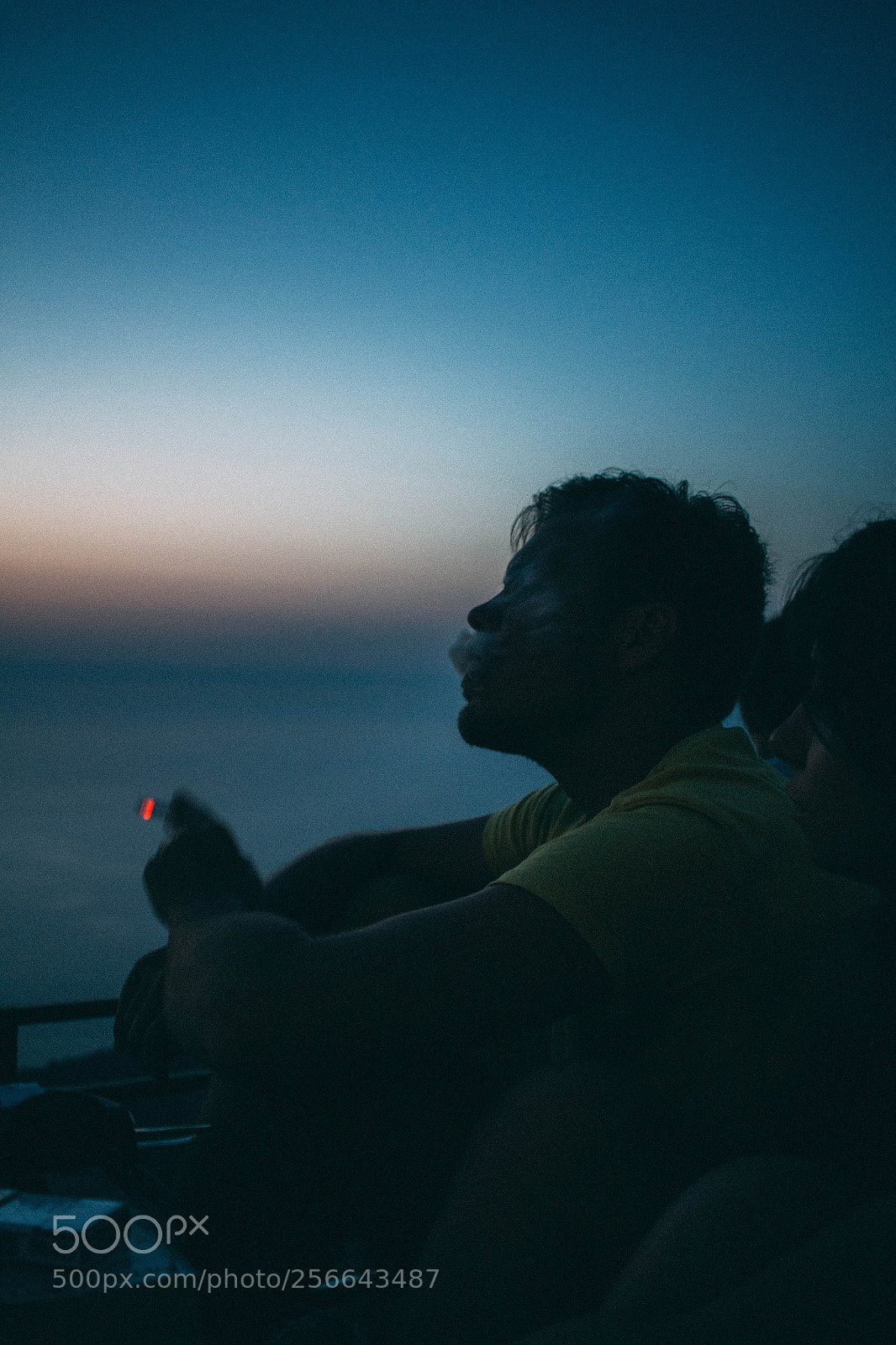 Canon EOS 100D (EOS Rebel SL1 / EOS Kiss X7) sample photo. Man smoking on sunset photography