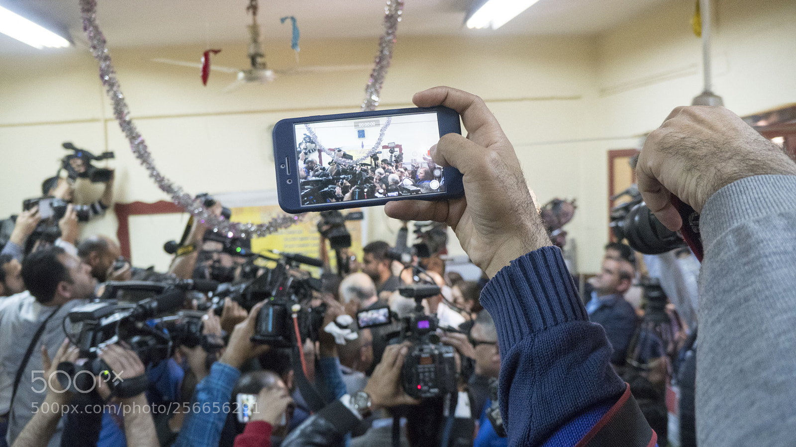 Sony a6500 sample photo. A reporter using his photography