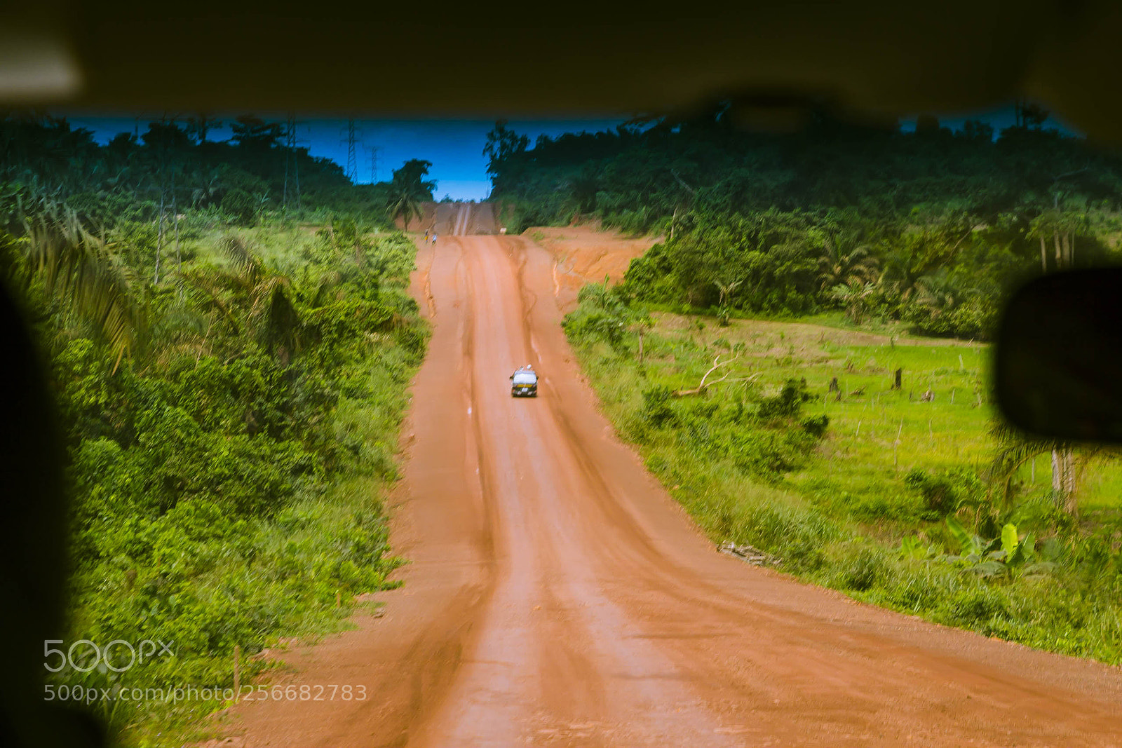 Canon EOS 60D sample photo. Ghanaian red dirt highway photography