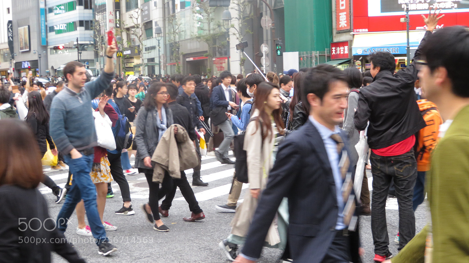 Canon PowerShot SX720 HS sample photo. Thousands of people walk photography