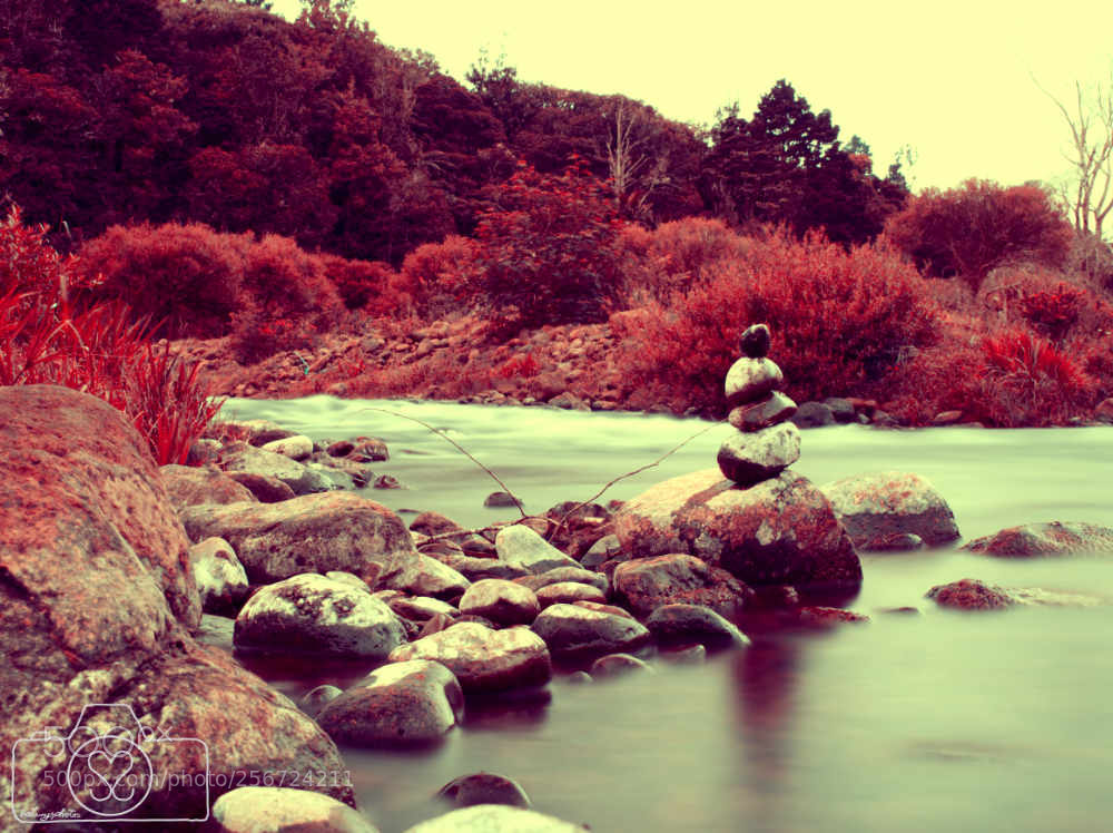 Olympus OM-D E-M10 II sample photo. Stone tower at river photography