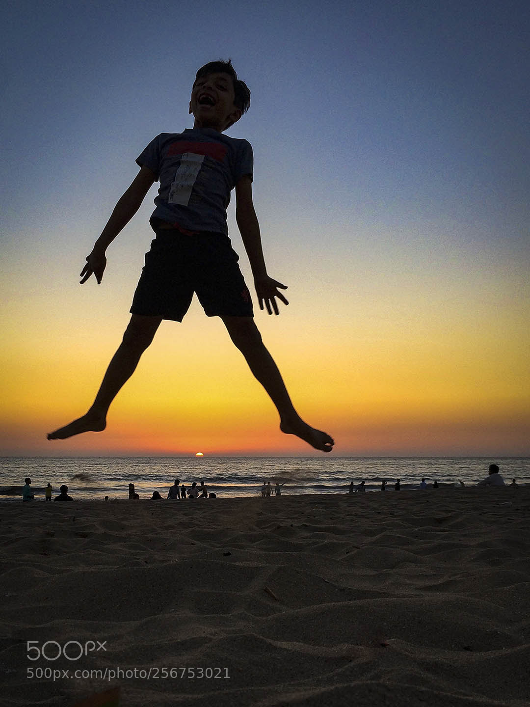Apple iPhone 5s sample photo. "beach jumper" photography