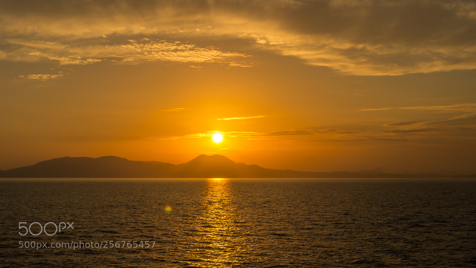 Nikon D3100 sample photo. Sunset behind corfu island photography