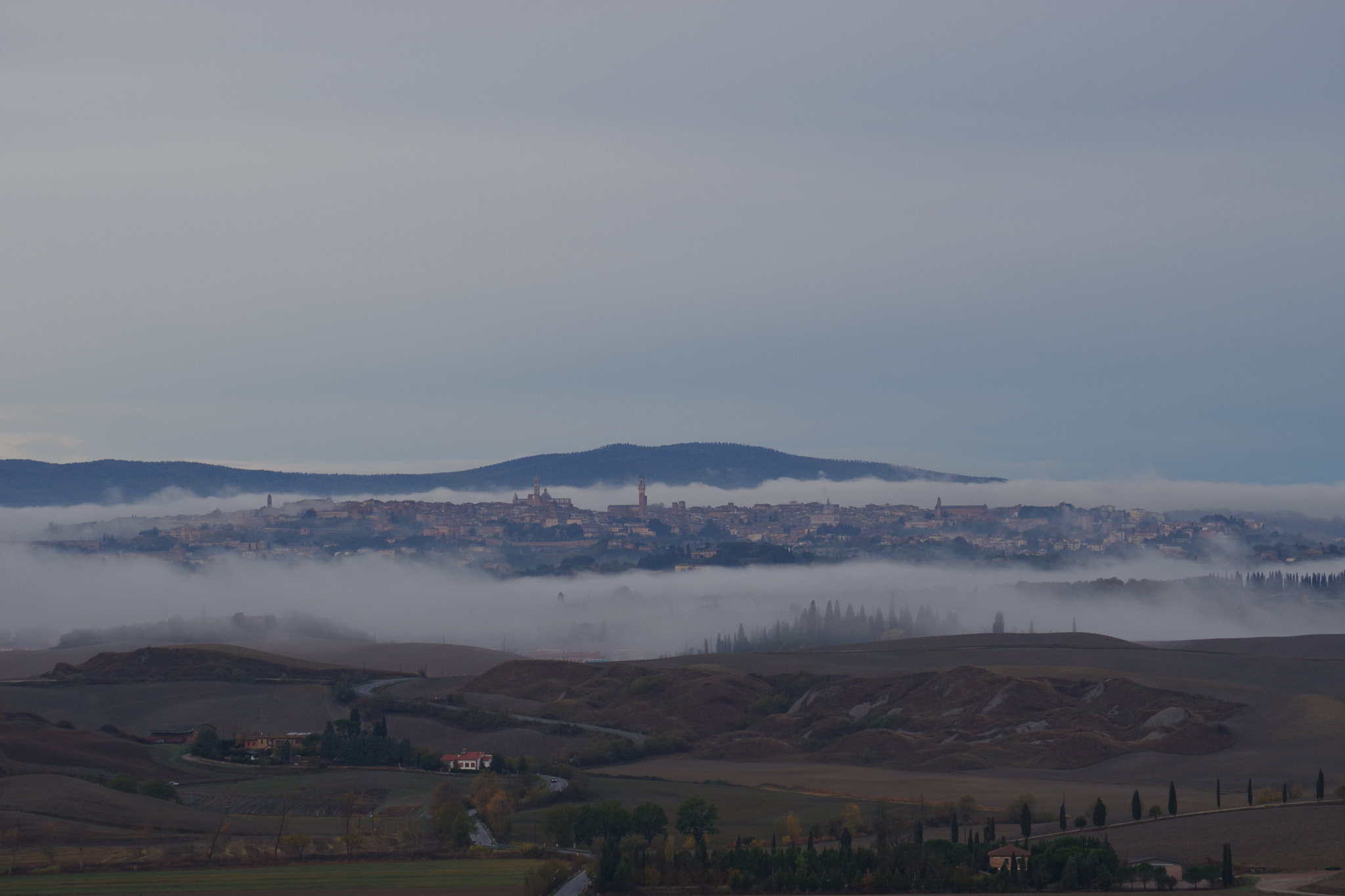 Pentax K-70 + smc Pentax-DA L 50-200mm F4-5.6 ED WR sample photo. Fog outside of siena photography