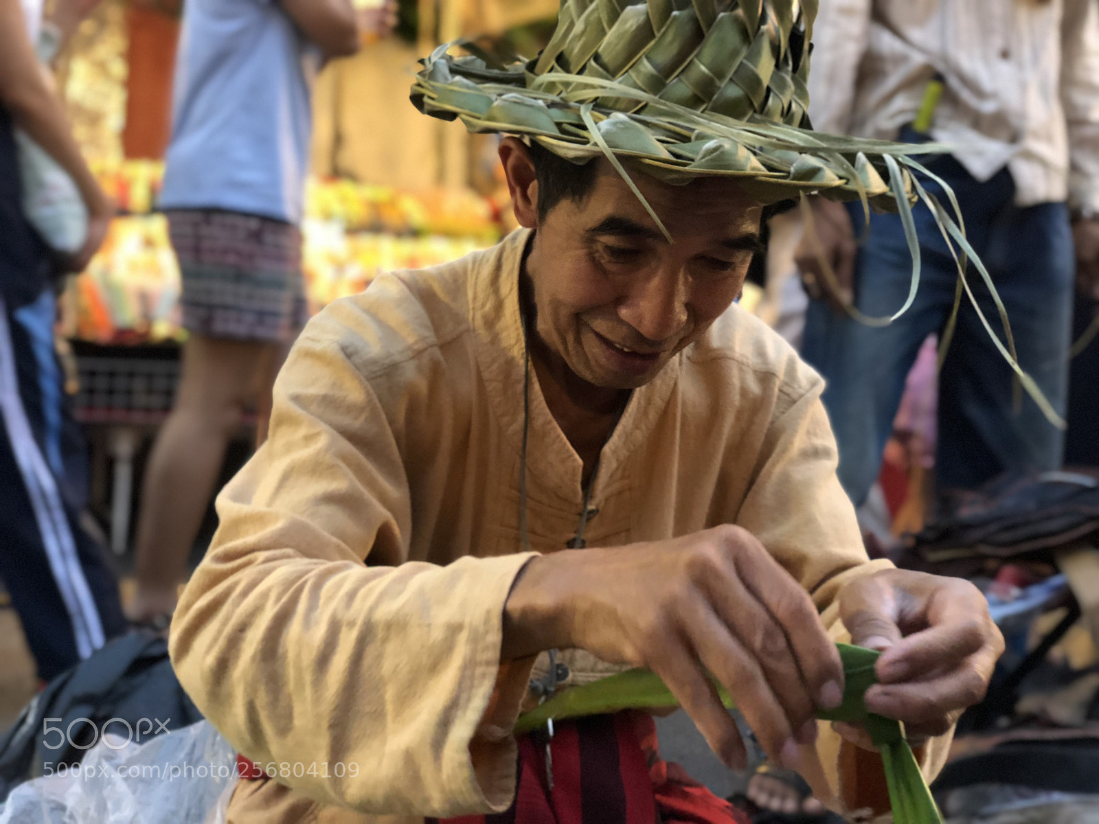Apple iPhone X sample photo. A man making hats photography