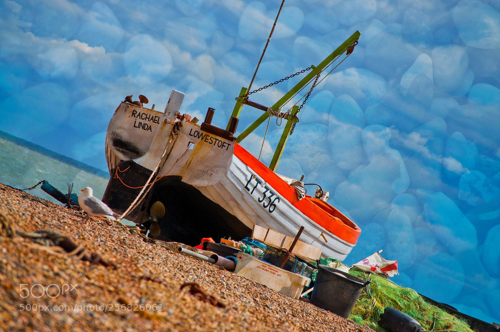 Nikon D5000 sample photo. Boat and stones photography