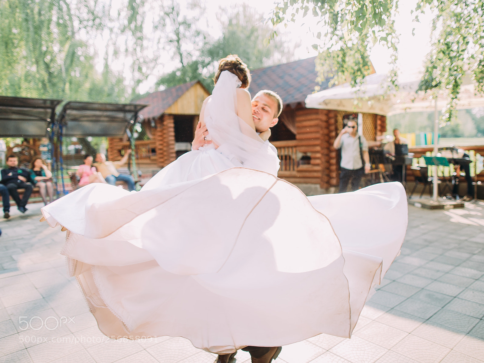 Canon EOS 6D sample photo. Groom is spinning the photography