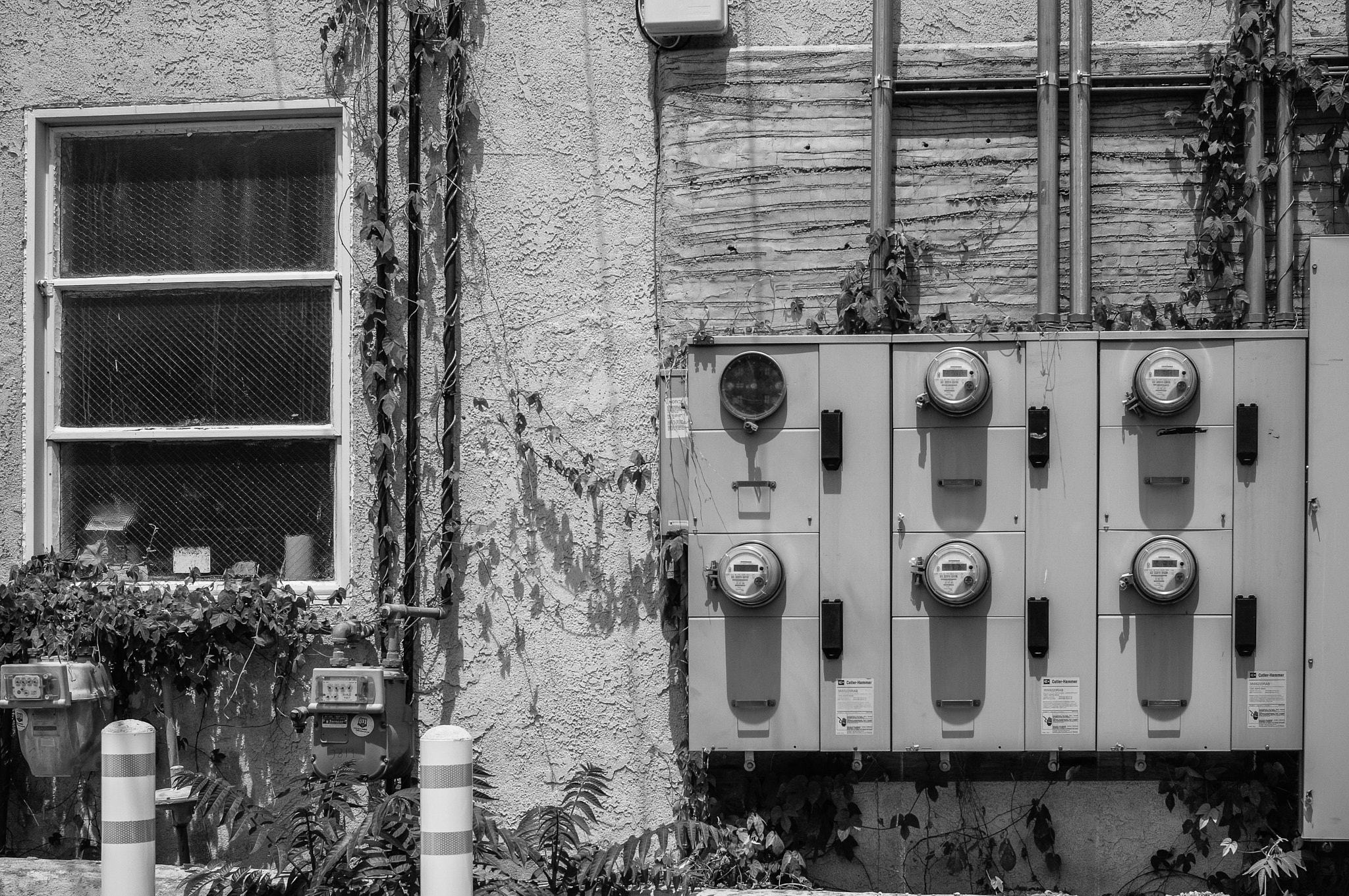 Ricoh GXR A12 sample photo. Stucco and meters photography