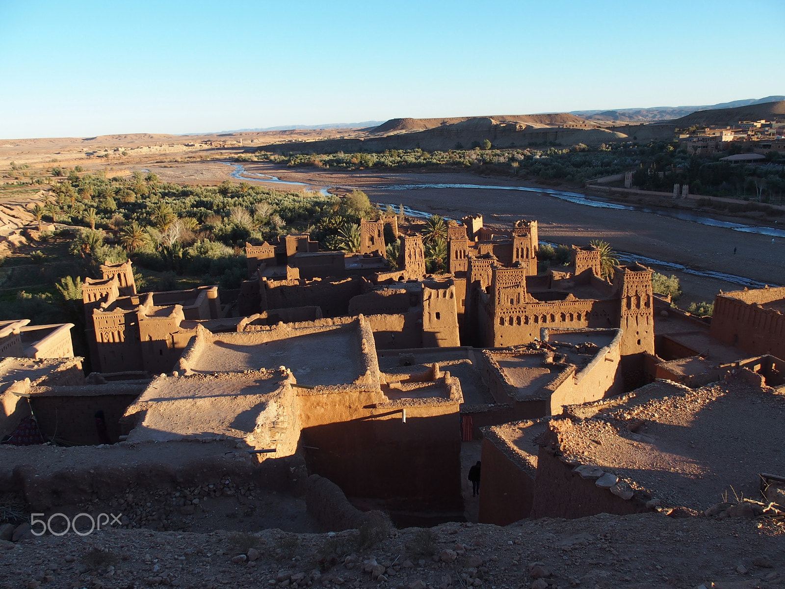 Olympus STYLUS1,1s sample photo. Kasbah ait ben haddou and scenic view of river at oasis on african atlas mountains range... photography