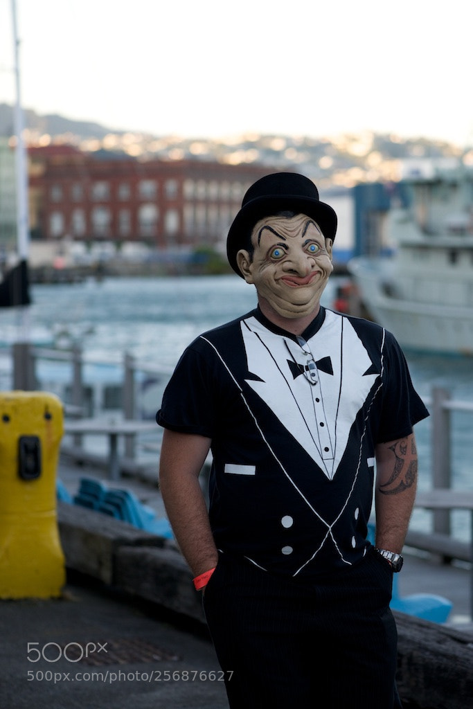 Nikon D600 sample photo. Man in mask walking photography