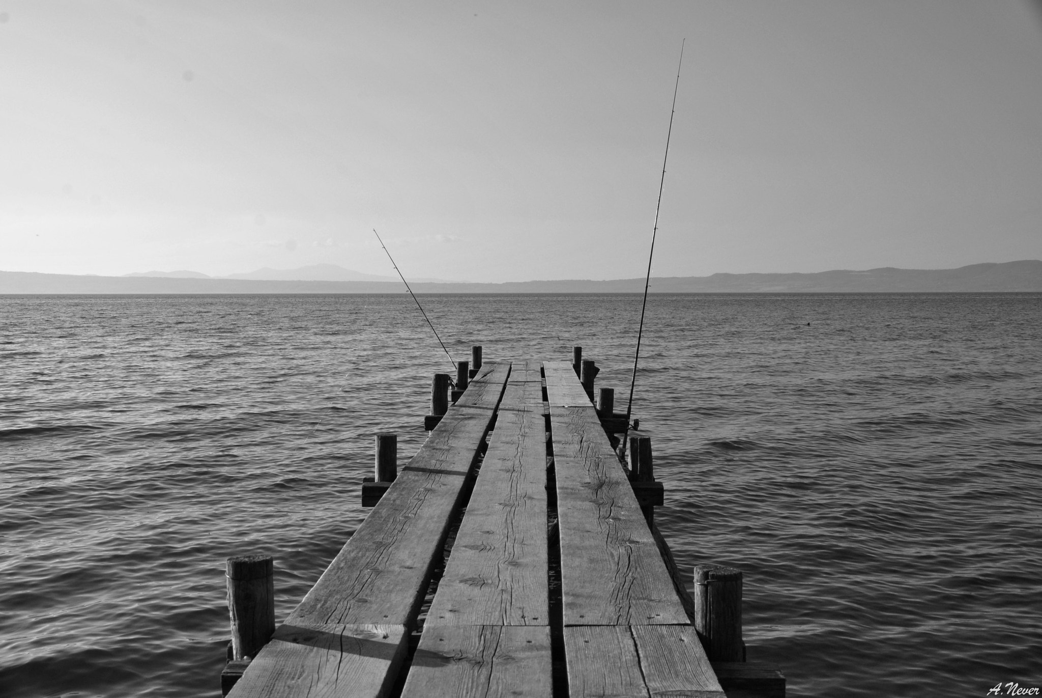 Nikon D3000 sample photo. Lago di bolsena - pontile sul lago photography