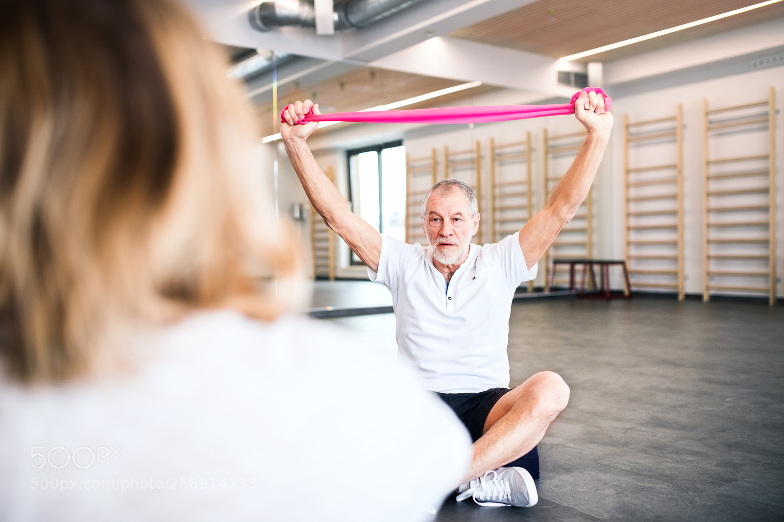 Nikon D5 sample photo. Senior physiotherapist working with photography