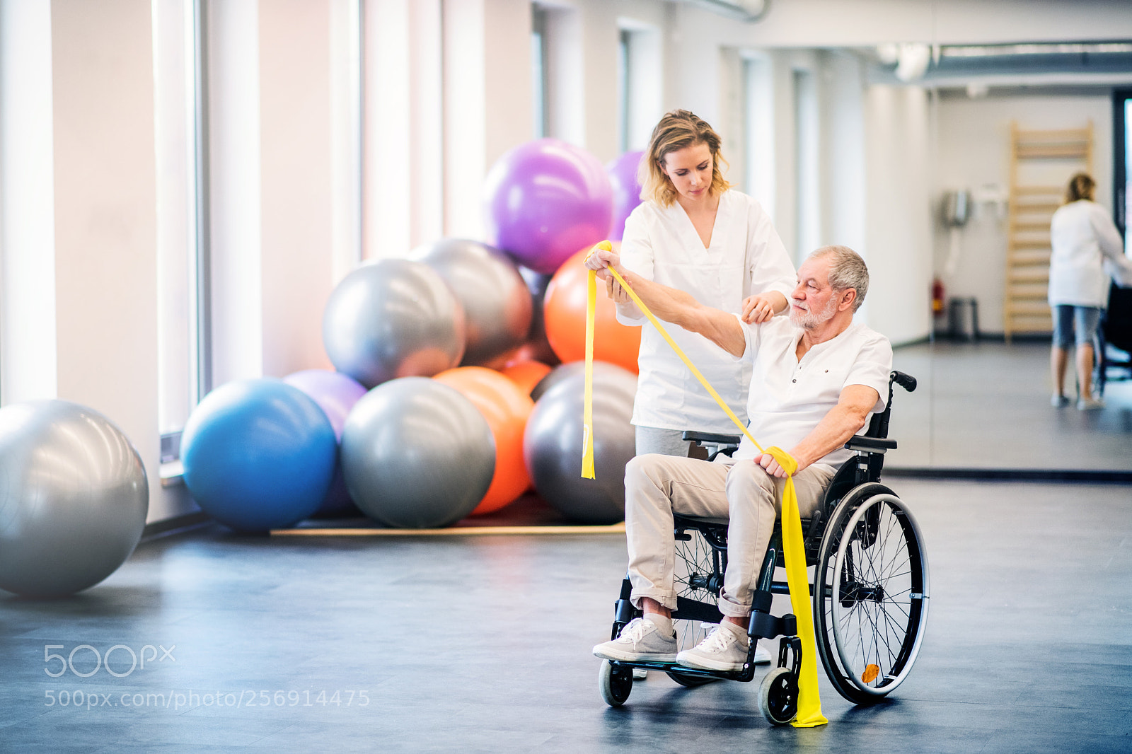 Nikon D5 sample photo. Young woman physiotherapist working photography