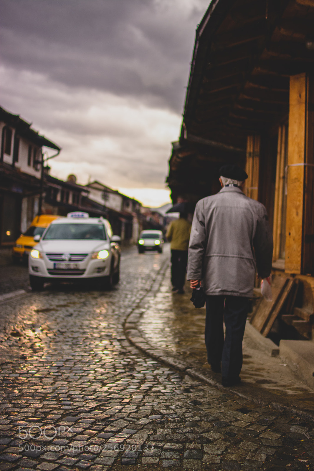 Nikon D7100 sample photo. One elderly man is photography