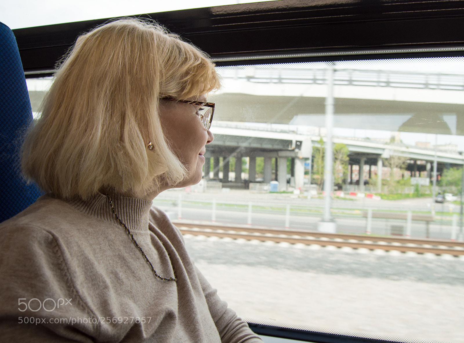 Nikon D3200 sample photo. Happy blond woman with photography