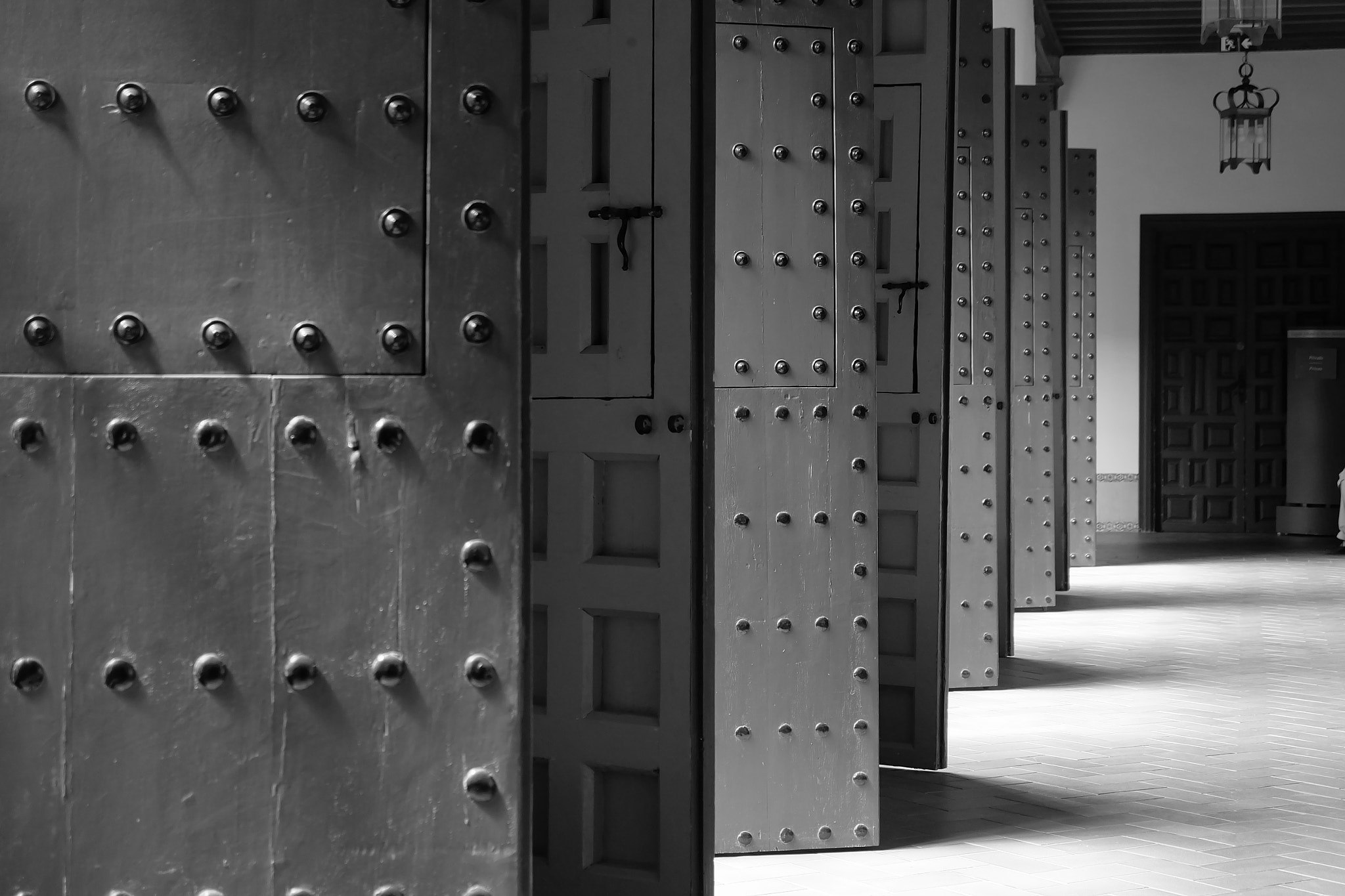 Fujifilm X-A2 sample photo. Old doors bw photography