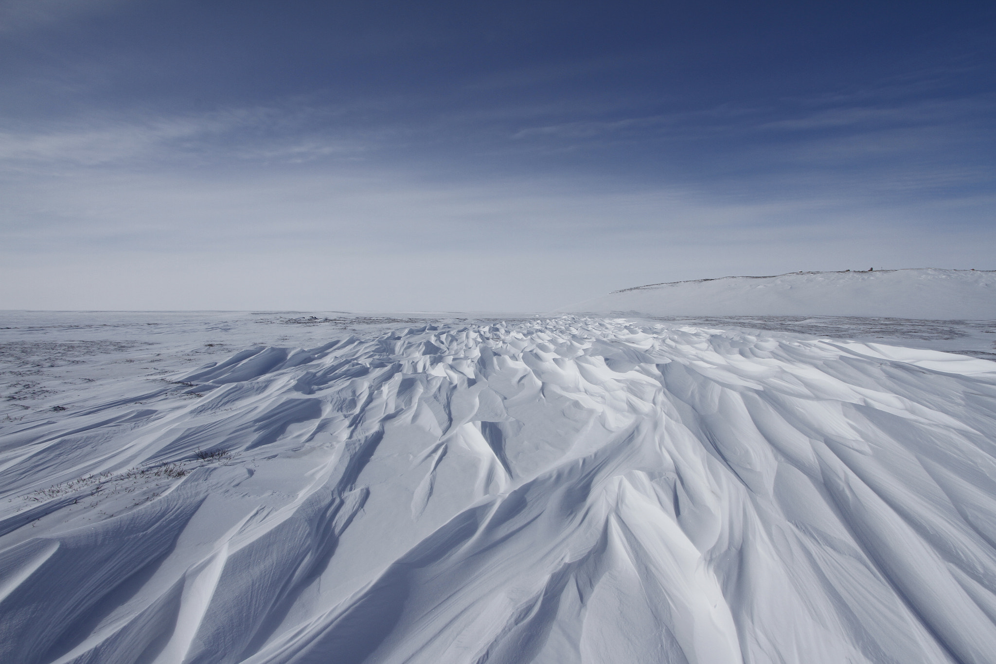 Canon EF-S 10-22mm F3.5-4.5 USM sample photo. Beautiful patterns of sastrugi, parallel wavelike ridges caused by winds on surface of hard snow photography