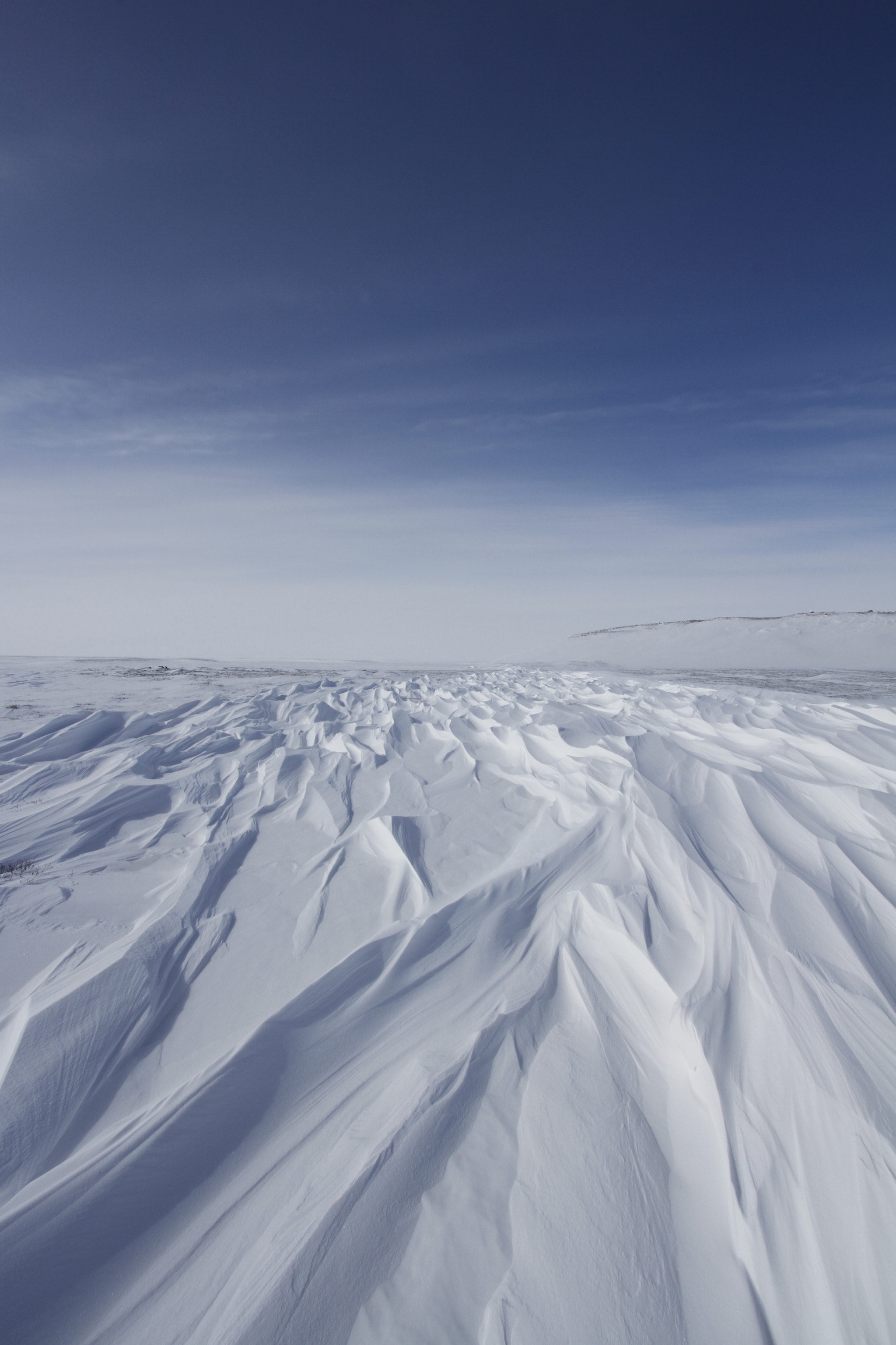 Canon EOS 7D + Canon EF-S 10-22mm F3.5-4.5 USM sample photo. Beautiful patterns of sastrugi, parallel wavelike ridges caused by winds on surface of hard snow photography