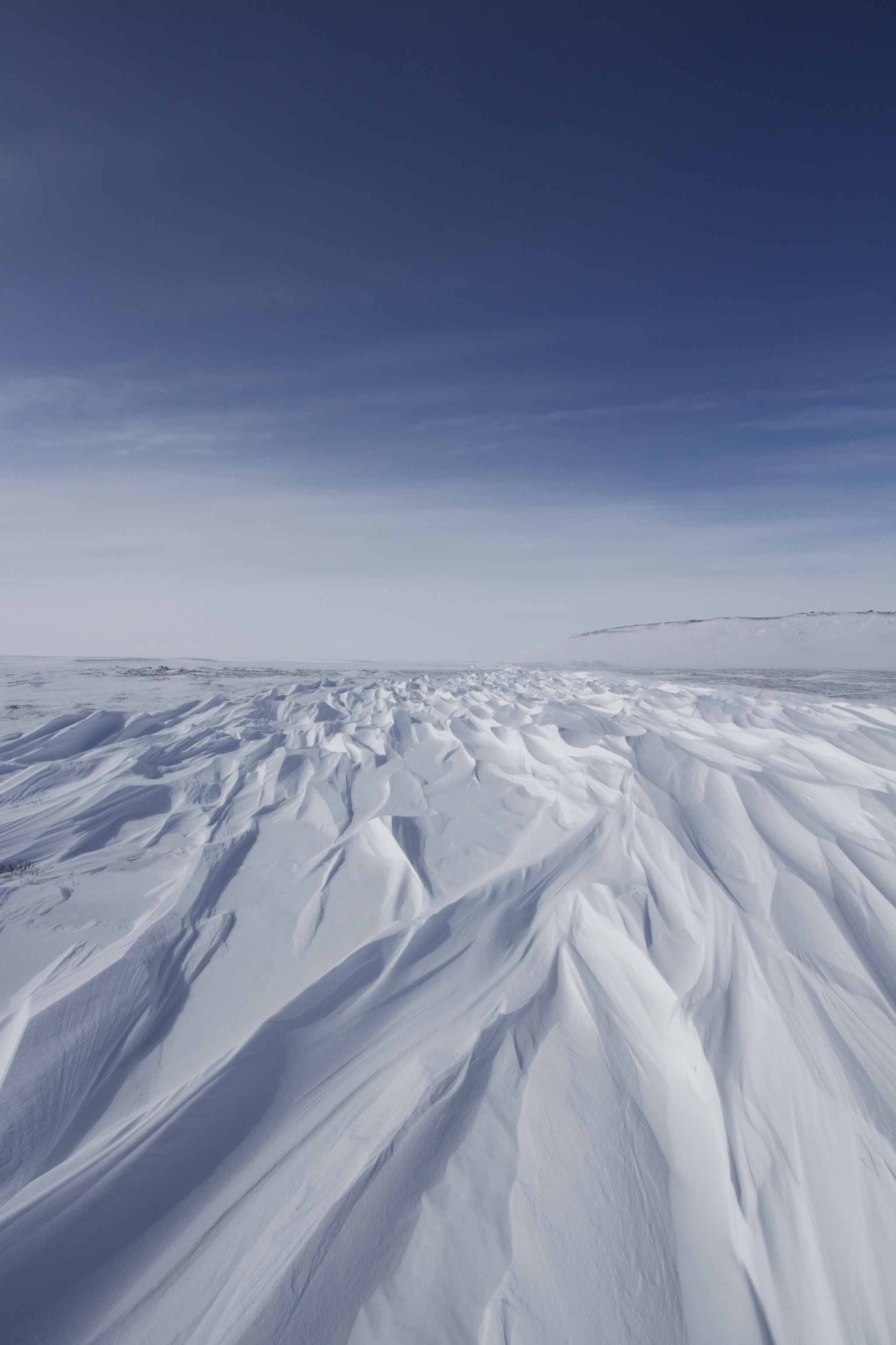 Canon EF-S 10-22mm F3.5-4.5 USM sample photo. Beautiful patterns of sastrugi, parallel wavelike ridges caused by winds on surface of hard snow photography