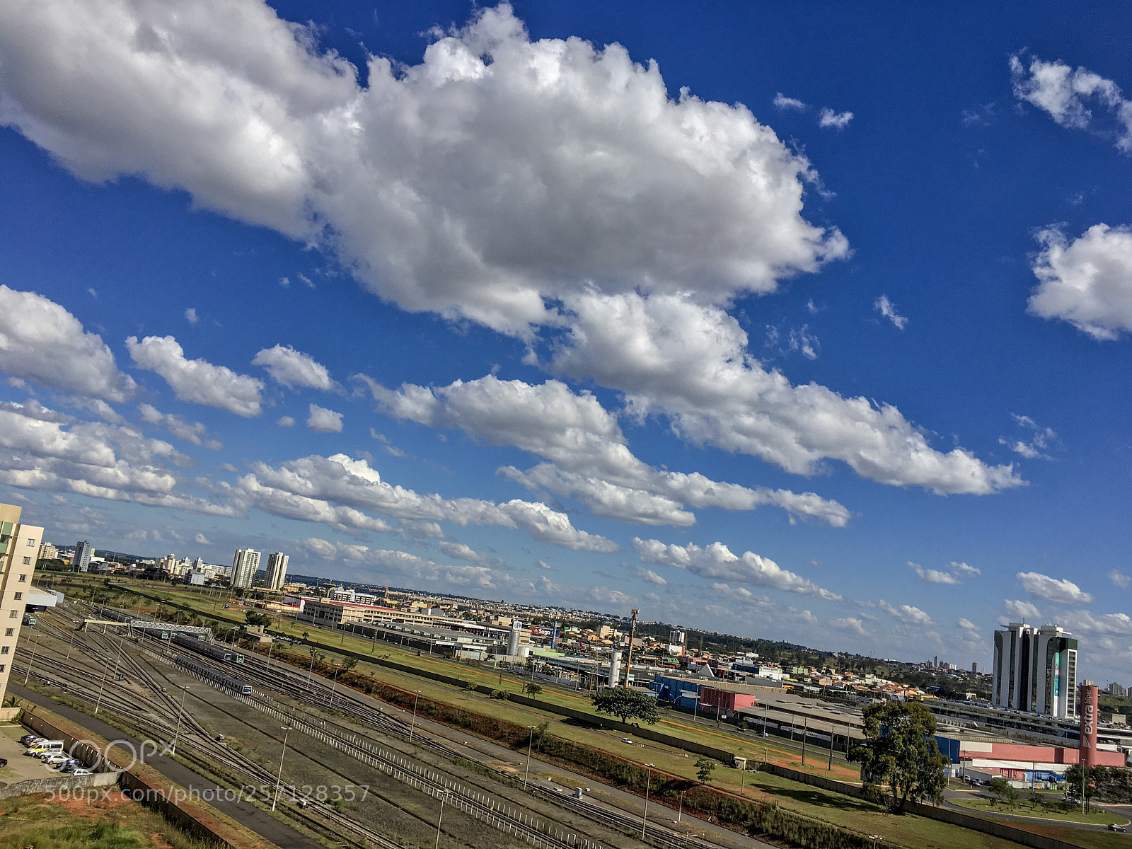 Apple iPhone 6s sample photo. Clouds and train tracks  photography