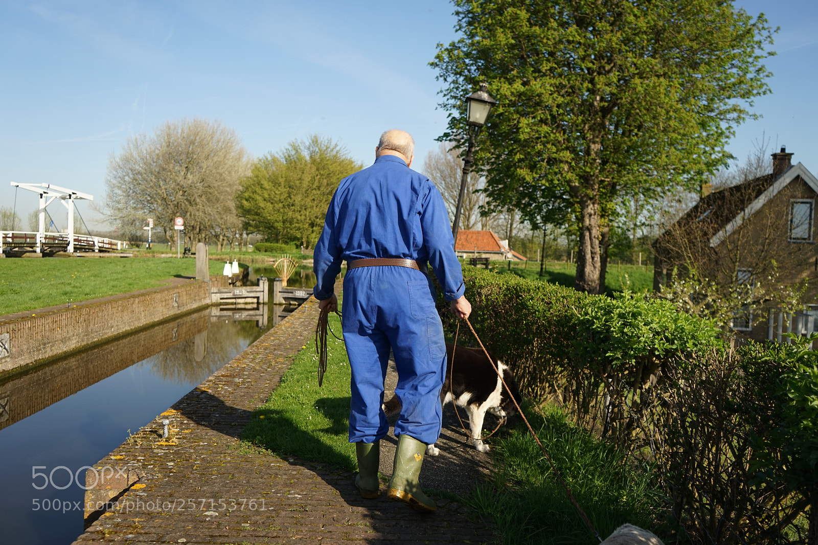 Sony a7 sample photo. Farmer with dog photography