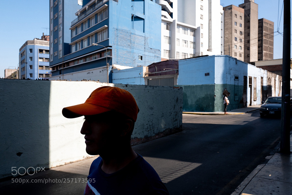 Leica Q (Typ 116) sample photo. Orange cap at street photography