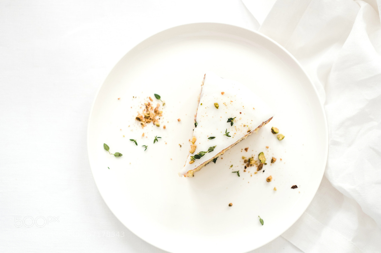 Fujifilm X-T2 sample photo. Pistache cake on white photography