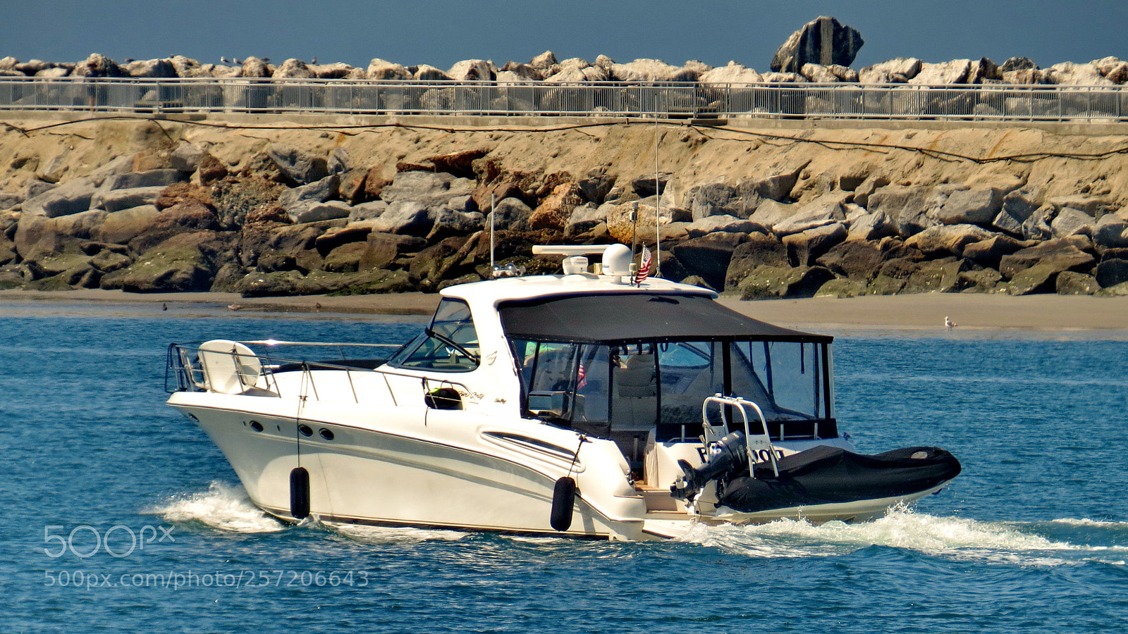Canon PowerShot SX50 HS sample photo. Powerboat cruising out to photography