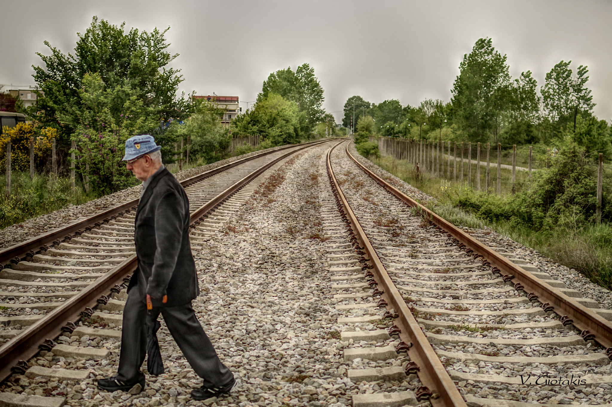 Pentax KP sample photo. Old man on the railroad photography