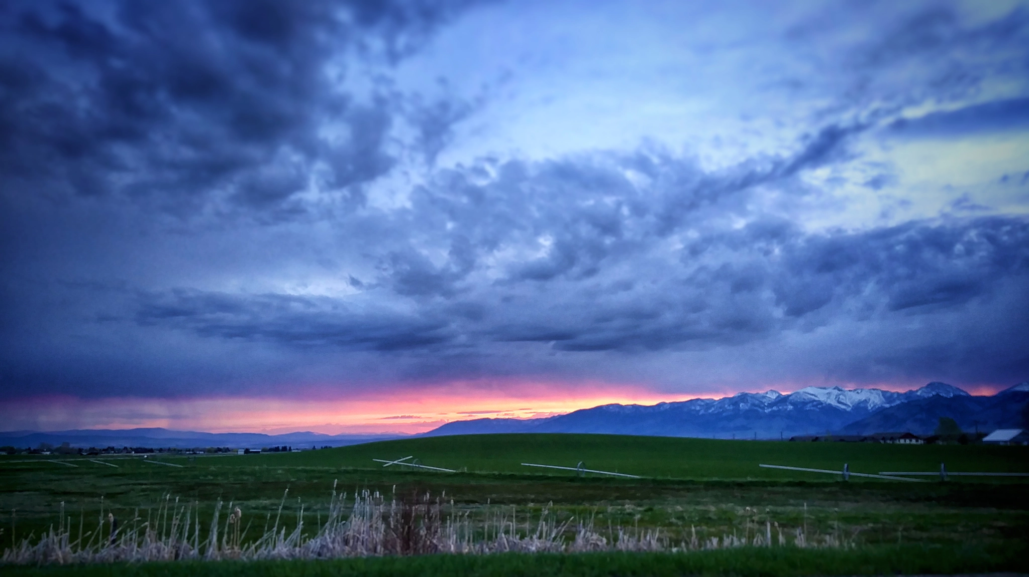 LG FIESTA LTE sample photo. Rains and sunrise over bridger range photography