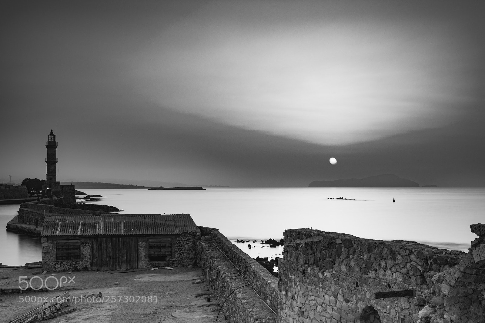 Nikon D850 sample photo. Sun setting with hazy photography