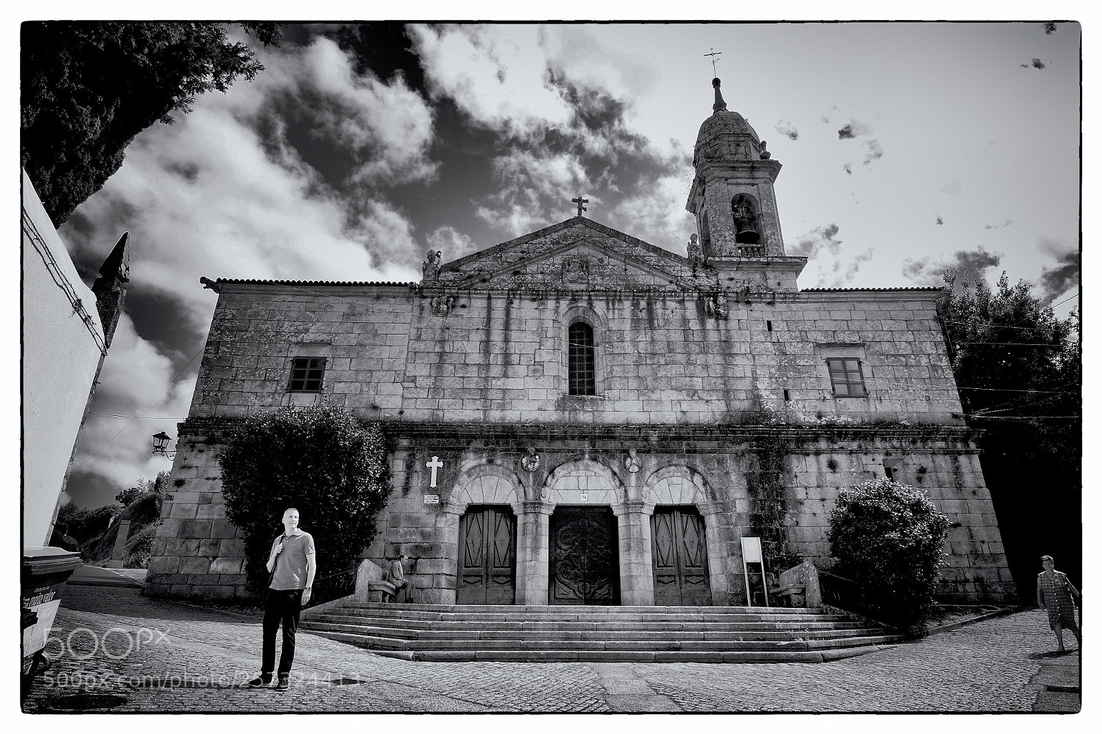 Fujifilm X-Pro1 sample photo. Men front a church photography