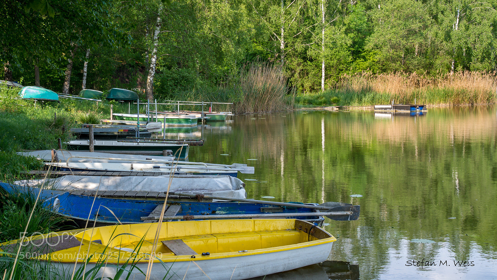 Olympus OM-D E-M10 II sample photo. Fishingboats on the lake... photography