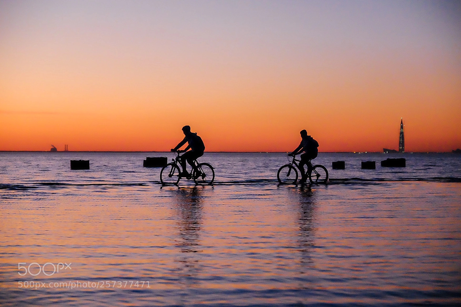 Fujifilm X-T1 sample photo. Cyclists at sunset photography