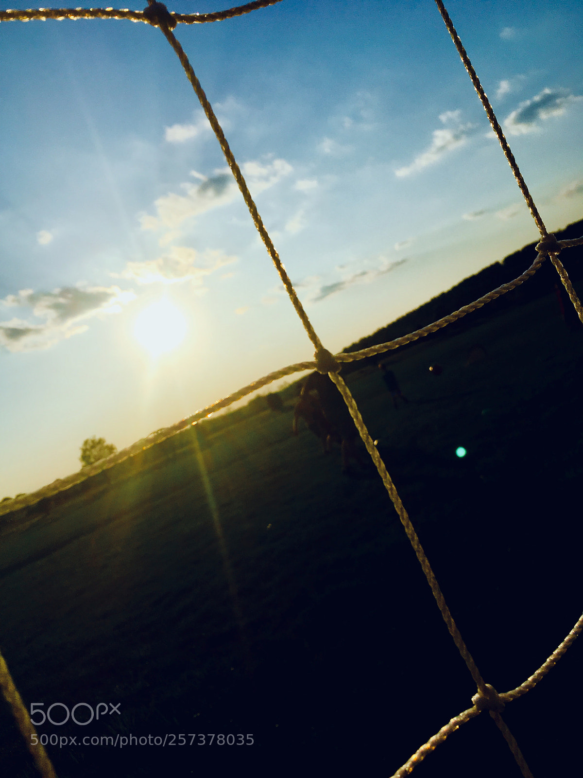 Apple iPhone SE sample photo. Soccer net sunset photography