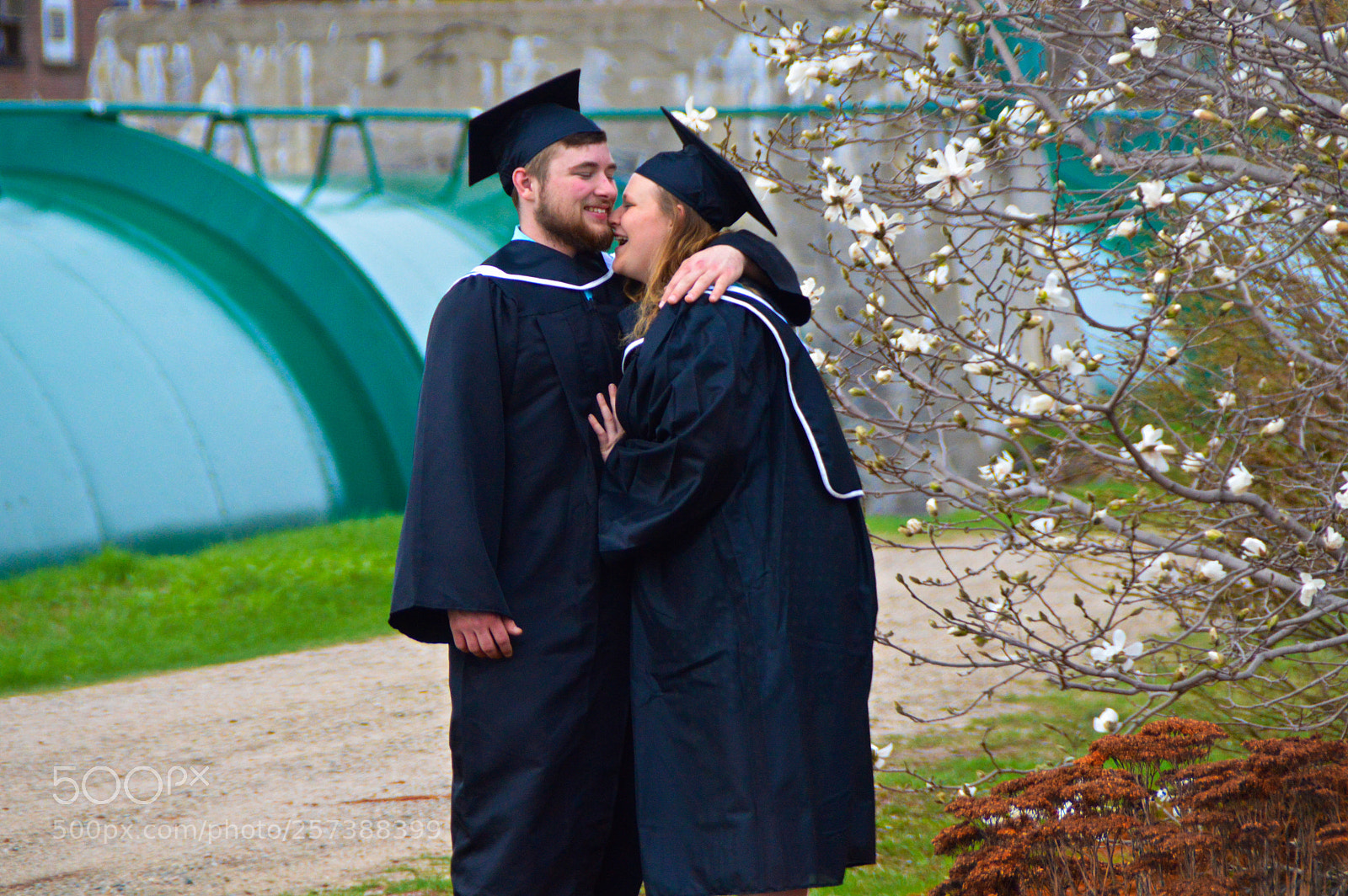Nikon D3200 sample photo. Young love at graduation photography