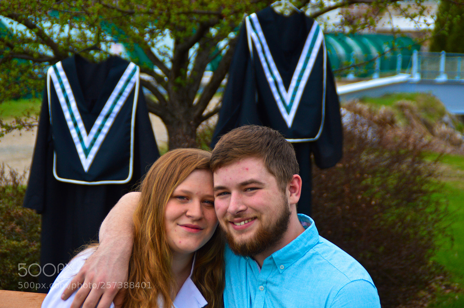 Nikon D3200 sample photo. Young love at graduation photography