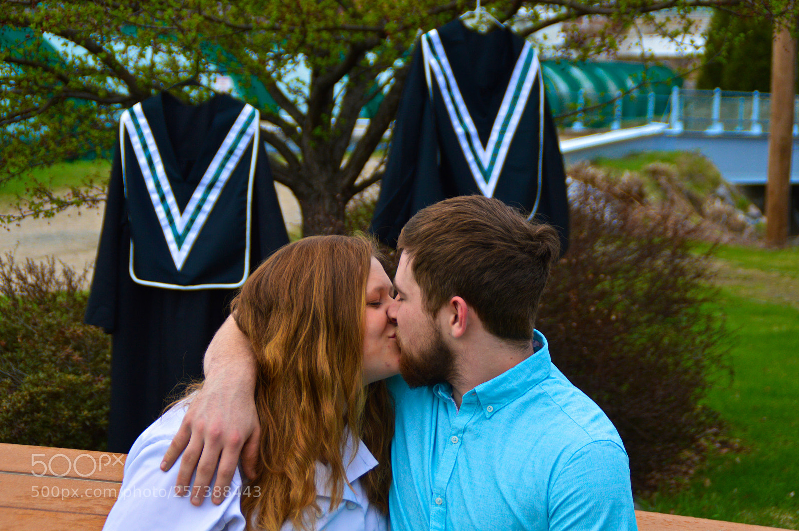 Nikon D3200 sample photo. Young love at graduation photography