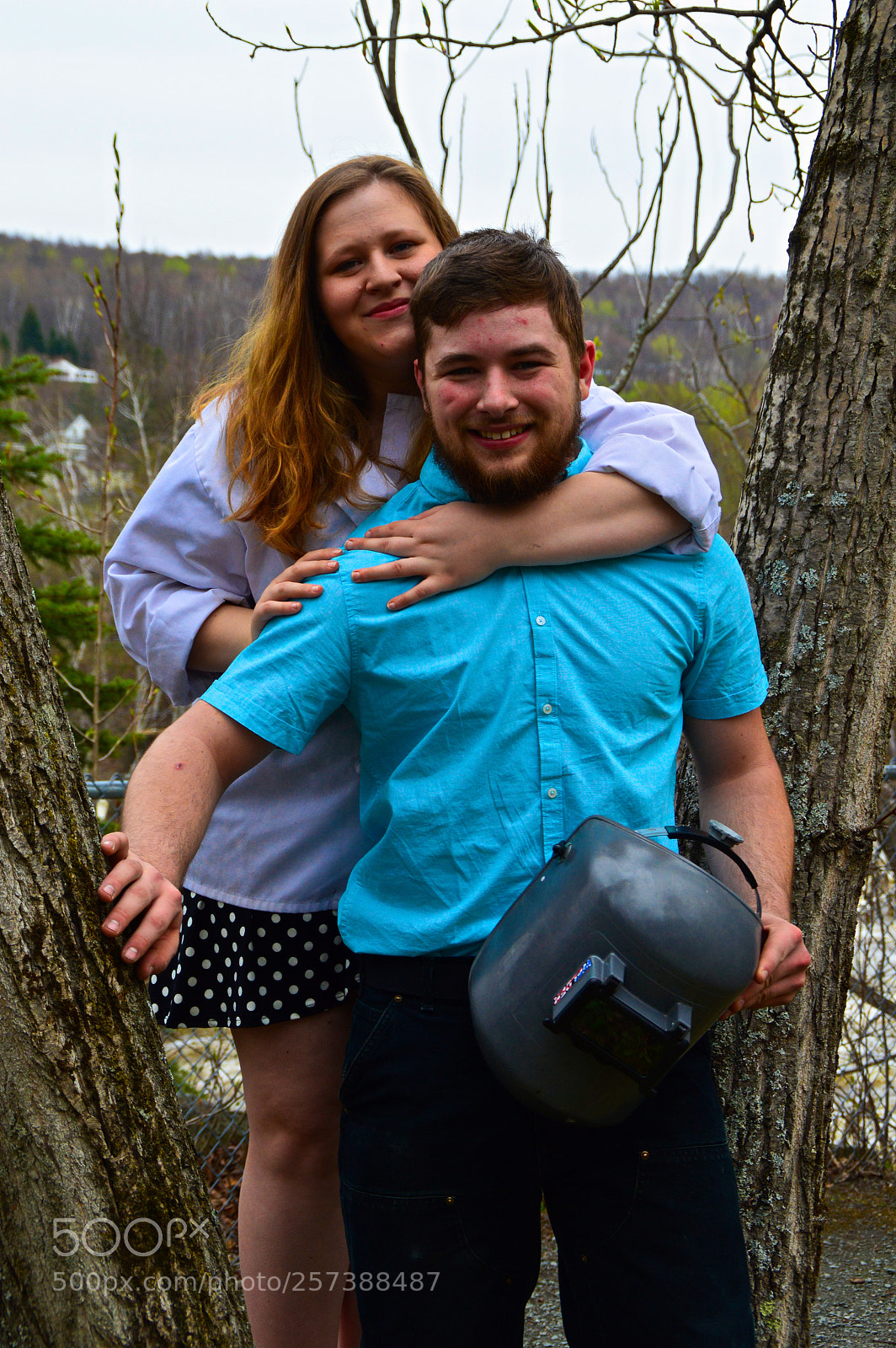 Nikon D3200 sample photo. Young love at graduation photography