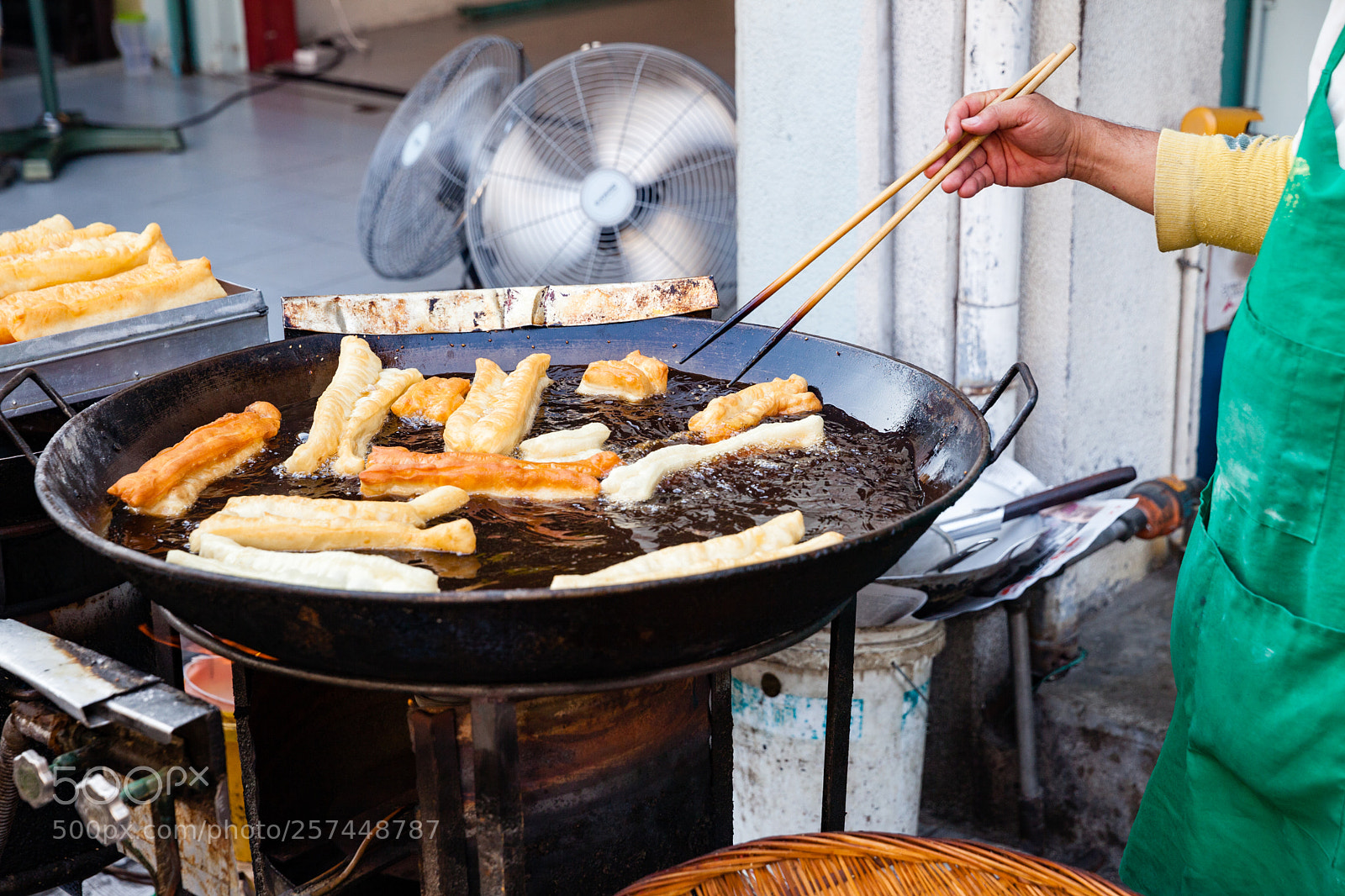 Canon EOS 5D Mark II sample photo. Man cooks youtiao at photography