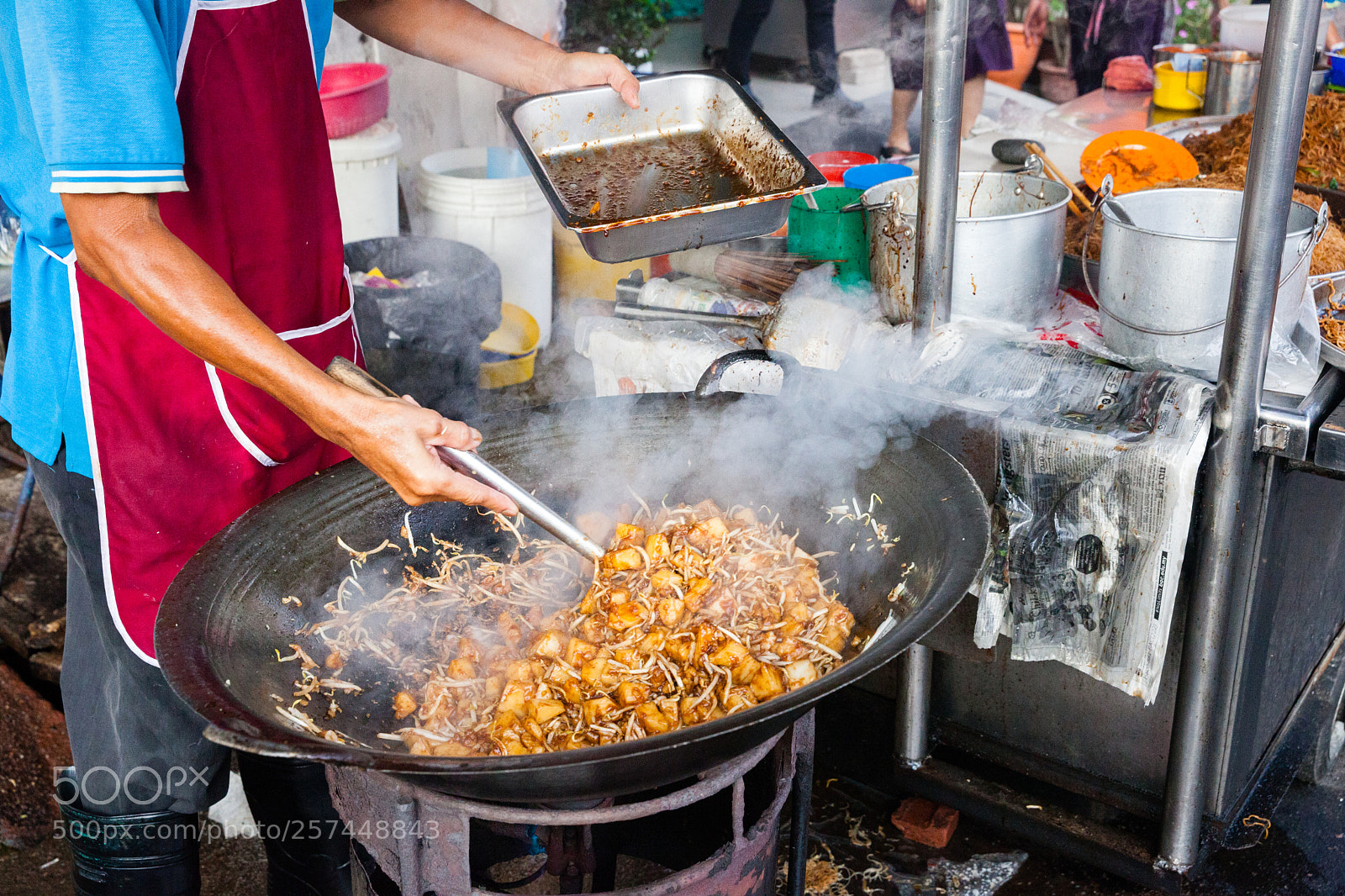 Canon EOS 5D Mark II sample photo. Man cooks food at photography