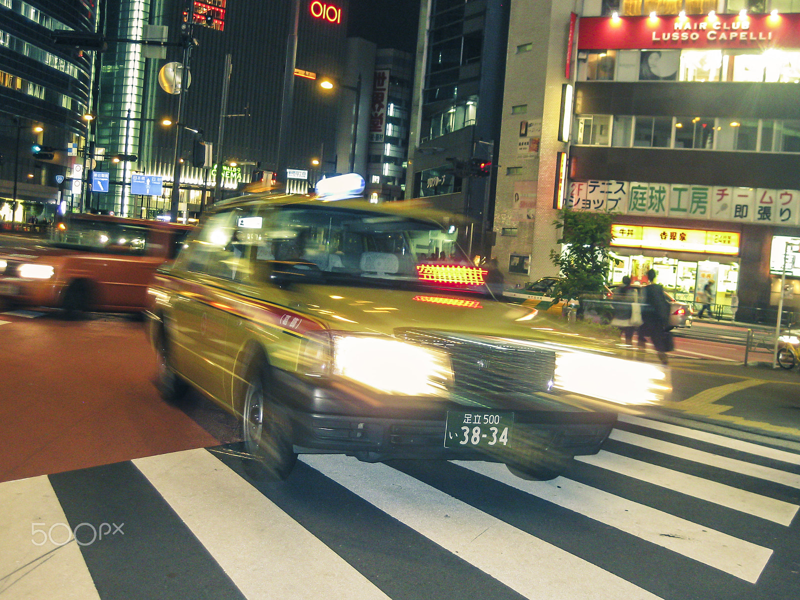 Canon PowerShot SD770 IS (Digital IXUS 85 IS / IXY Digital 25 IS) sample photo. Speeding tokyo yellow cab photography