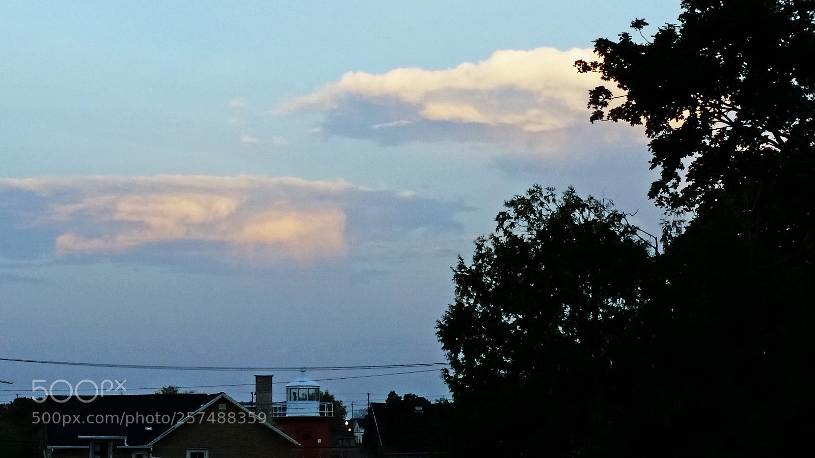 Samsung Galaxy S5 sample photo. Clouds above lighthouse photography
